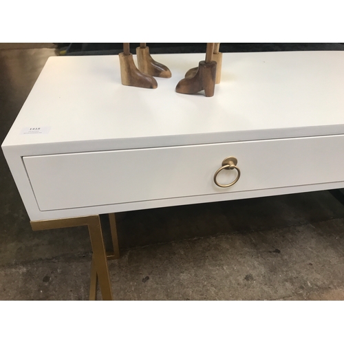 1418 - A white two drawer console table with gold legs