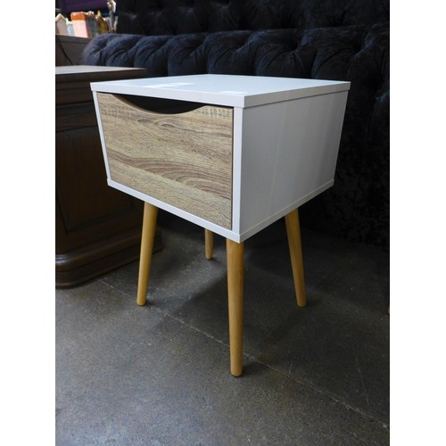 1424 - A pair of Rydon tall bedside chest