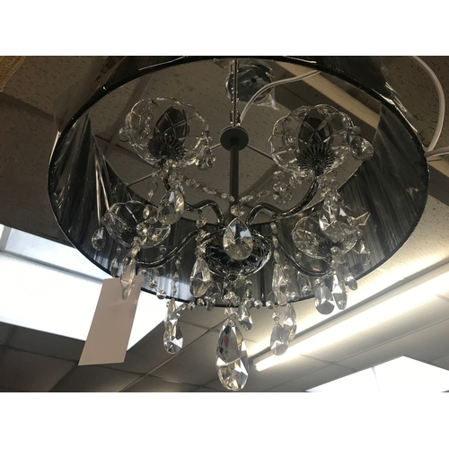 1438 - A five arm chandelier with black shade