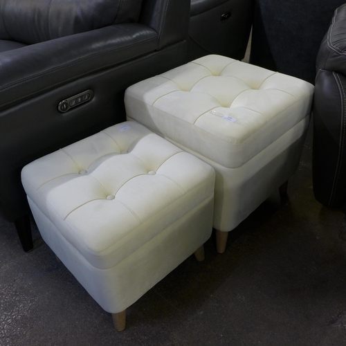 1443 - Two cream upholstered storage stools