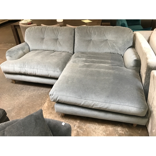 1445 - A grey velvet L shaped sofa on turned legs