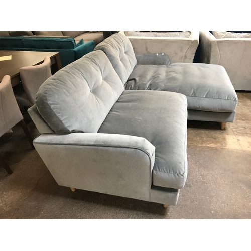 1445 - A grey velvet L shaped sofa on turned legs