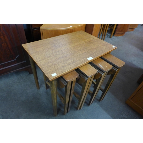 20 - A Paul Hundevad teak nest teak of tables