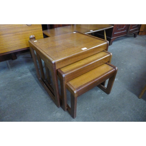 50 - A teak nest of tables