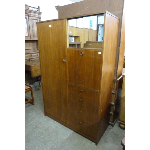 68 - An Avalon teak tallboy