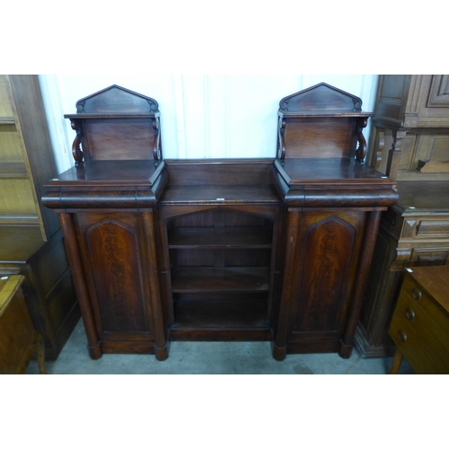 160 - A George IV mahogany breakfront open bookcase