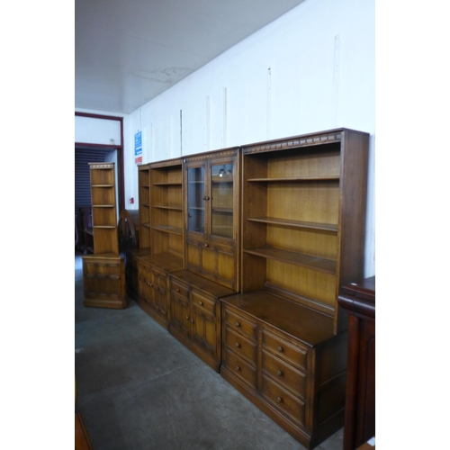 165 - A large Ercol Golden Dawn elm sectional wall unit