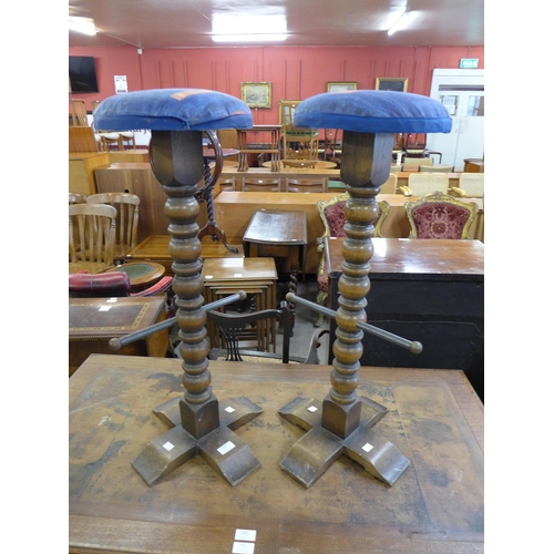 185 - A pair of French elm bar stools