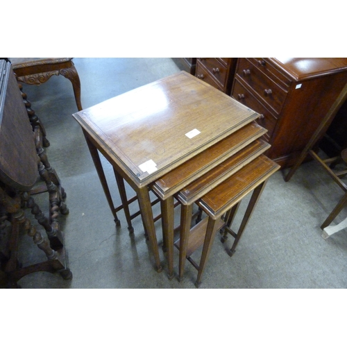 128 - An Edward VII inlaid mahogany nest of quartetto tables