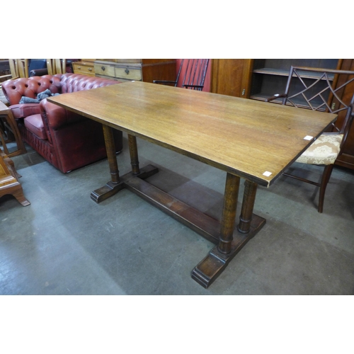 87A - A Heals style oak Churchill refectory table, manner of Philip Tilden