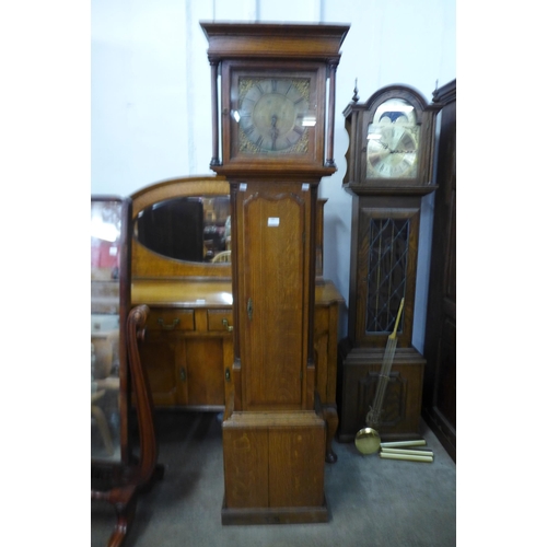 248 - A 19th Century oak 30-hour longcase clock, the brass dial signed Jos. Kember