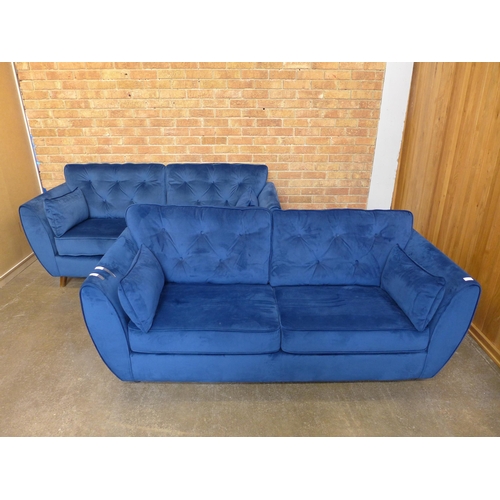 1499 - A pair of blue velvet three seater sofas (W- 188cm D- 80cm H- 90cm)