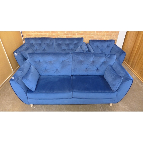 1500 - A pair of blue Hoxton velvet three seater sofas (W- 188cm D- 80cm H- 90cm) and arm chair (W- 192cm D... 