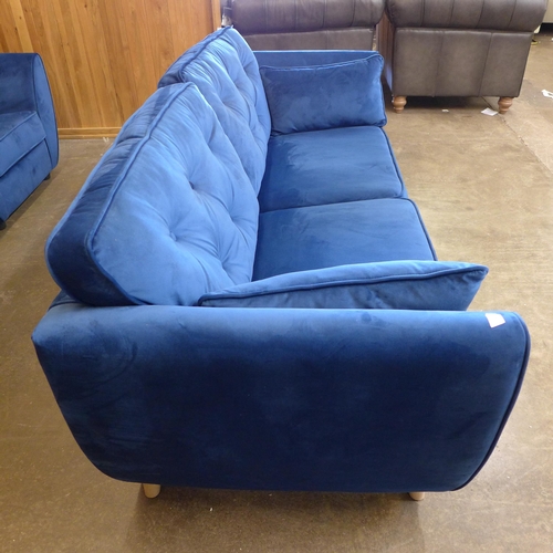 1500 - A pair of blue Hoxton velvet three seater sofas (W- 188cm D- 80cm H- 90cm) and arm chair (W- 192cm D... 