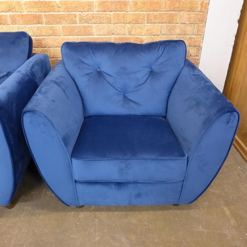 1500 - A pair of blue Hoxton velvet three seater sofas (W- 188cm D- 80cm H- 90cm) and arm chair (W- 192cm D... 