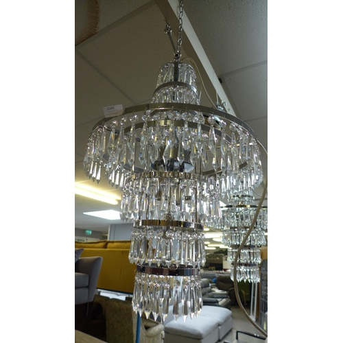 1515A - A glass three tier crystal chandelier, missing some droplets