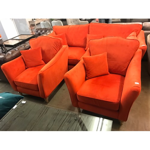 1305 - A tangerine velvet four seater sofa with a pair of armchairs - small tear on sofa