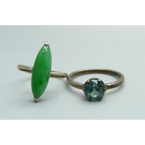 1000 - A Chinese jade ring and one other ring, K and O