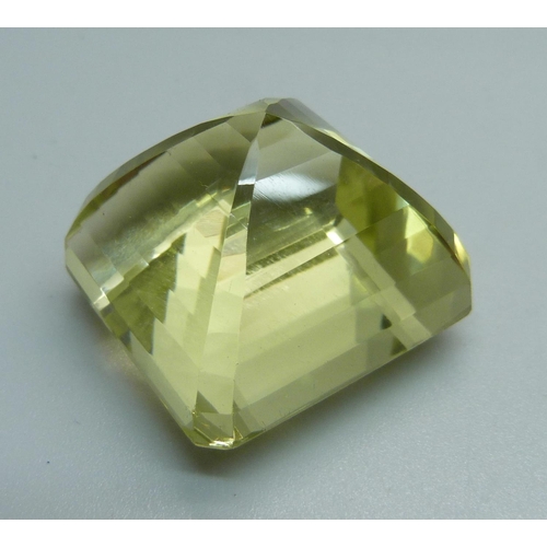 1002 - A large unmounted lemon coloured stone, 30.4g, 28mm x 28mm