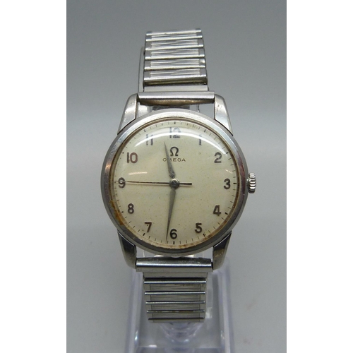 1021 - A 1960's gentleman's Omega wristwatch, the case back bears inscription dated 1961, with other Omega ... 