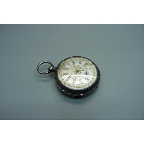 1023 - A late Victorian 935 silver cased pocket watch with silver dial, glass cracked