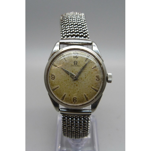 1027 - A 1960's stainless steel Omega wristwatch