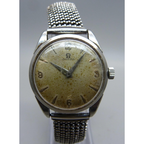 1027 - A 1960's stainless steel Omega wristwatch