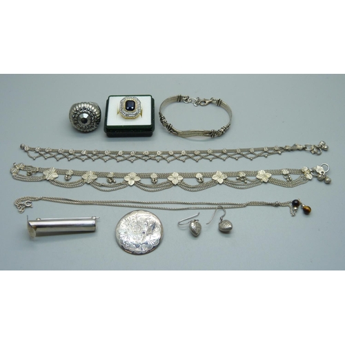 1029 - A pair of silver earrings and a brooch, a silver bracelet, a silver posy holder, a tigers eye set ne... 