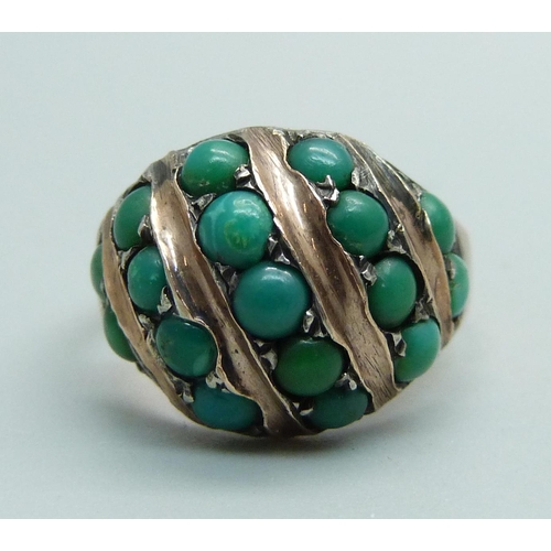 1030 - A yellow metal ring set with turquoise, 6.1g, O