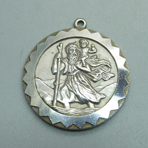 1033 - A Georg Jensen silver St. Christopher pendant, decorated to both sides, 30mm