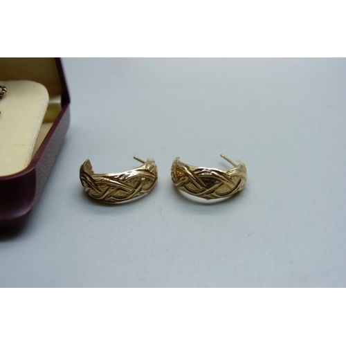 1034 - Two pairs of 9ct gold earrings, 1.8g