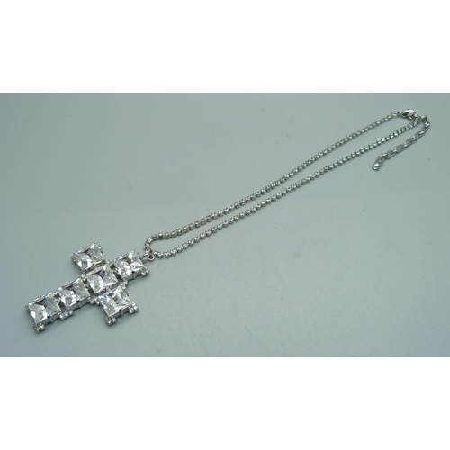 1049 - A large Butler and Wilson cross pendant and chain