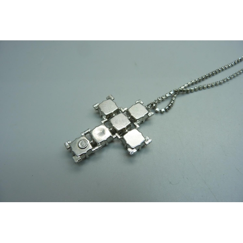 1049 - A large Butler and Wilson cross pendant and chain