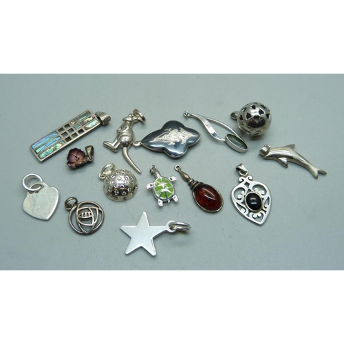 1053 - Fourteen silver pendants