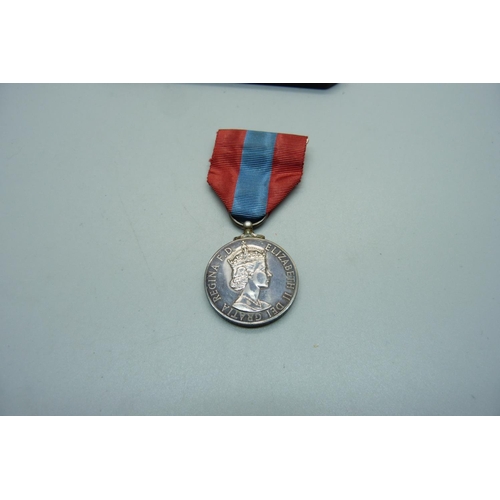 1055 - An Imperial Service Medal, William John Brooks, with letter, cased