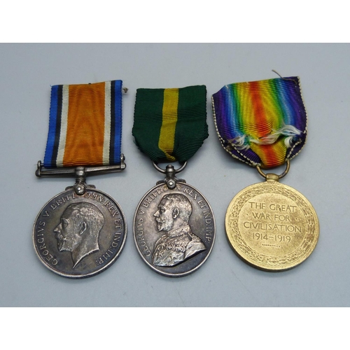 1062 - A group of three medals including Territorial Force Effificency Medal to 375104 W.O. CL 2 R. Arundal... 