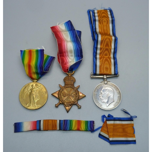 1063 - A pair of WWI medals to 33372 Spr. W.H. Wood, R.E., and a British War Medal to 152568 Gnr. J.W. Huts... 