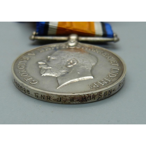 1063 - A pair of WWI medals to 33372 Spr. W.H. Wood, R.E., and a British War Medal to 152568 Gnr. J.W. Huts... 