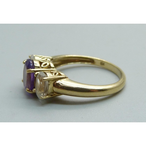 1068 - A 9ct gold, amethyst and white stone ring, 3.3g, N