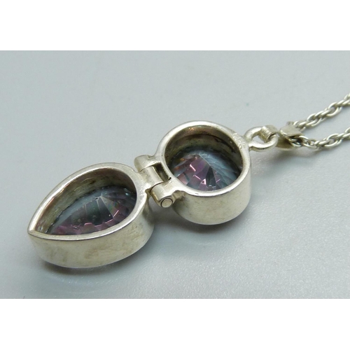 1072 - A silver and mystic topaz pendant and chain