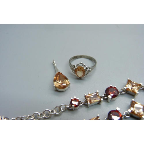 1074 - A silver and citrine pendant, bracelet and ring set, ring size Q