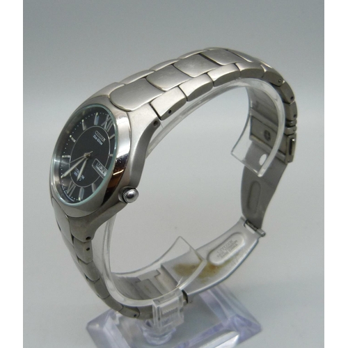 1079 - A gentleman's Citizen Eco Drive Calendar 100MT CLC titanium wristwatch, E101-K18434