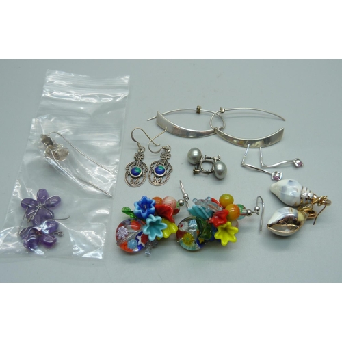 1083 - A pair of Arts and Crafts silver earrings and seven other pairs of earrings