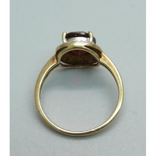 1097 - A 9ct gold, red and white stone set ring, 2.8g, P