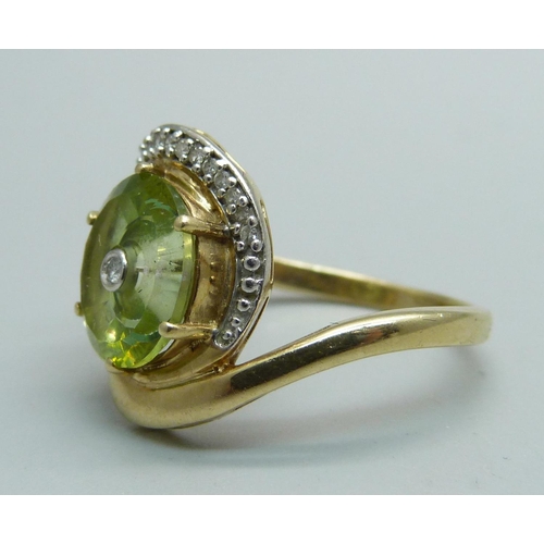 1098 - A 9ct gold, green stone and diamond set ring, marked Lehar, 4.2g, S