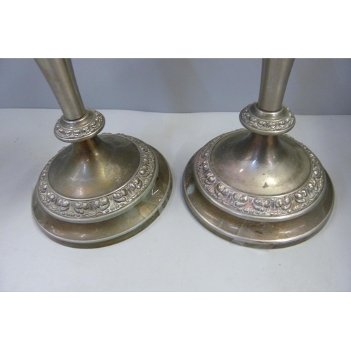 1108 - Two plated candlesticks