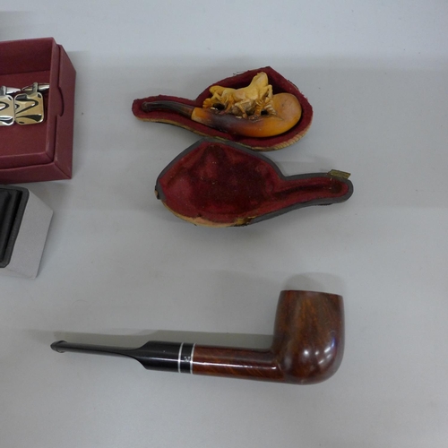 609 - Eight pairs of cufflinks and two pipes