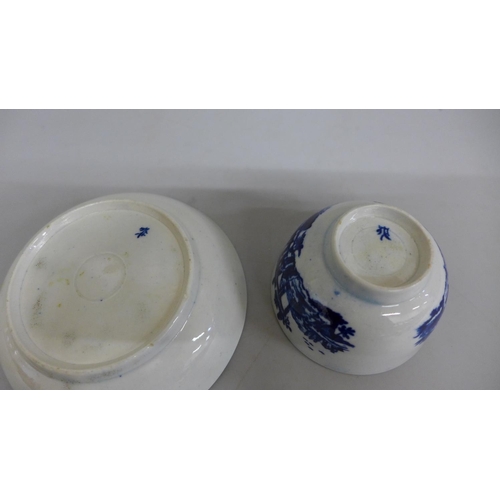 613 - A mid-18th Century Worcester porcelain blue and white cup and saucer, marked 1751 to 1760