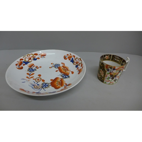 614 - An 18th Century Derby porcelain dish and a cup, chip on the rim of the dish