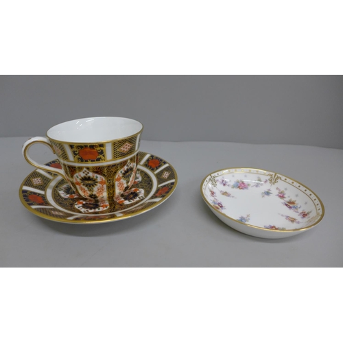 615 - A Royal Crown Derby 1128 pattern cup and saucer and a Royal Antoinette pattern pin dish